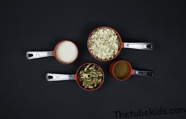 7 Common Mistakes Parents Make When Baking Muffins with Kids (And How to Fix Them) 3 kitchen measuring cups spoon